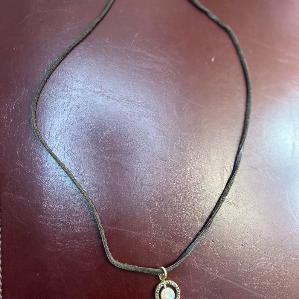 Elegant Gold and Silver Pendant Necklace